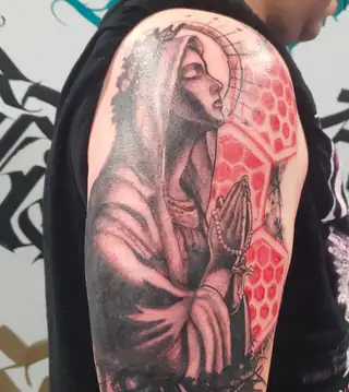 Praying figure tattoo by Keith, Calgary Tattoo Company